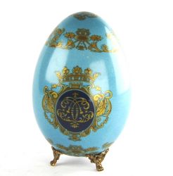 "noblesse a paris" medium sized egg with stand in bronze, art 0683200